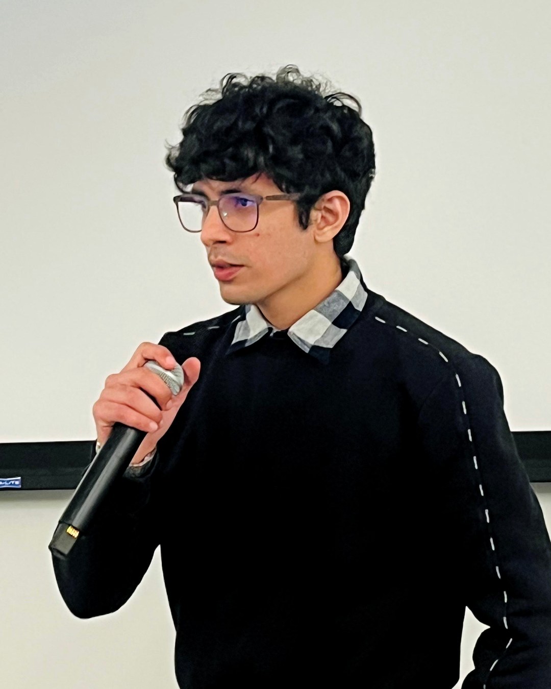 Sujal Charak presenting his work